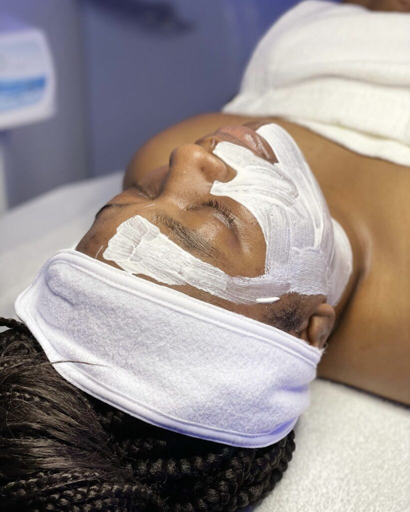 A person with white bandages on their head.